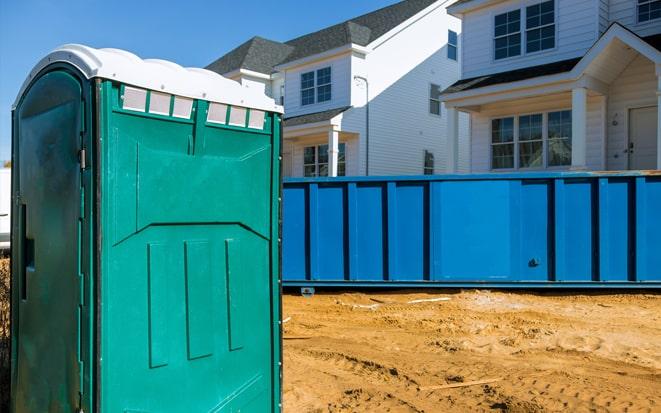 dumpster and portable toilet at a construction site in Federal Way WA